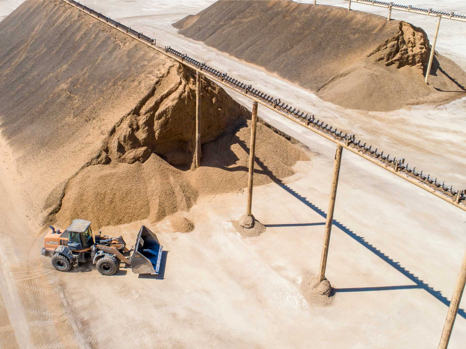 1-1-1-Commodity-poles-with-loader-courtesy-CCAGA-S